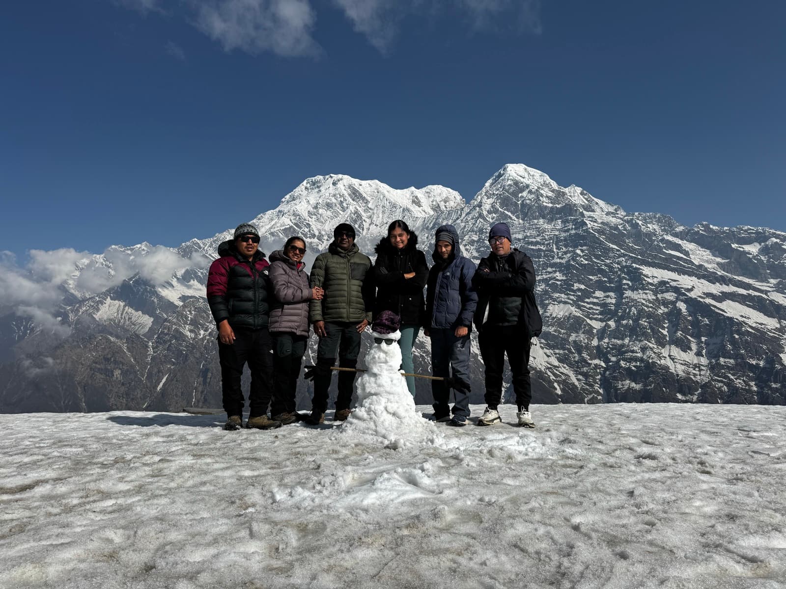 Our team at the Mardi Himal viewpoint, 4,500 m, with Annapurna South behind